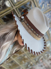 Load image into Gallery viewer, Tailored West Embellished Mist Hickstead Bailey Western Hat with Custom Brown Leather Band and Stitching, feathers, conchos, burlap, braid