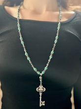 Load image into Gallery viewer, Made by Tailored West Jewelry Monarch Collection Necklaces Handmade Made in America USA Beaded necklace with hematite stones turquoise and silver colored beads with silver key pendant
