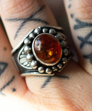 Load image into Gallery viewer, Handcrafted Amber Heavy Signet Ring with Sterling Silver Details made with Old World Artisan Silversmithing. Handcrafted in Colorado
