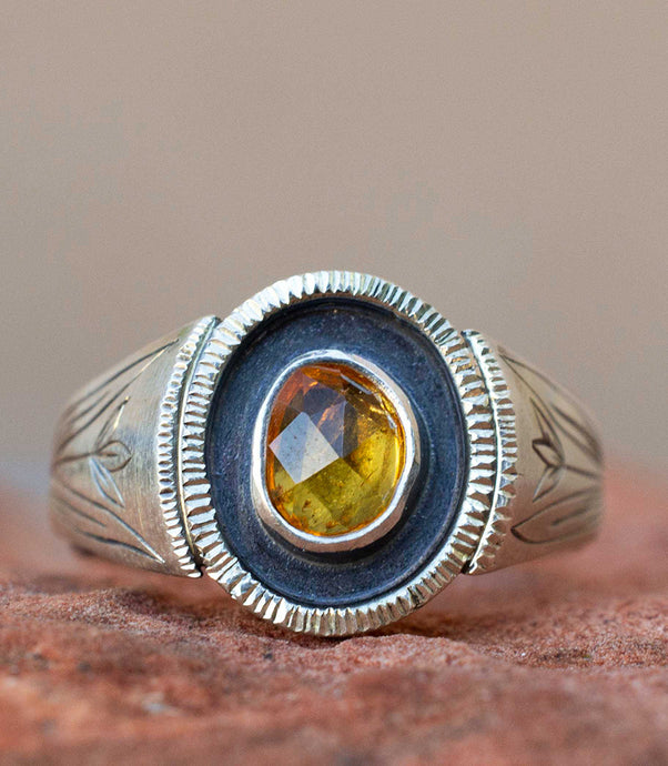 Handcrafted Garnet Sunray Signet Ring with Sterling Silver Details made with Old World Artisan Silversmithing. Handcrafted in Colorado
