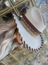 Load image into Gallery viewer, Tailored West Embellished Mist Hickstead Bailey Western Hat with Custom Brown Leather Band and Stitching, feathers, conchos, burlap, braid
