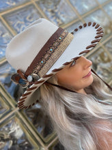 Load image into Gallery viewer, Tailored West Embellished Mist Hickstead Bailey Western Hat with Custom Brown Leather Band and Stitching, feathers, conchos, burlap, braid
